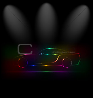 Silhouette of colorful car in darkness