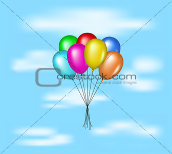 Multicolored balloons flying on blue sky