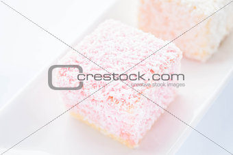 Lamington sponge cakes on the plate
