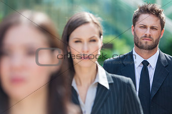 Business Man Businessman in Line Behind Business Women