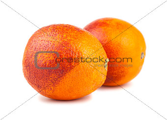 Pair of whole blood red oranges