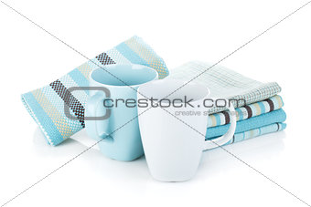 Kitchen towels and tea cups