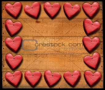 Red Hearts Frame on Wooden Boards