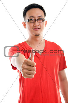 Thumb up good looking young Southeast Asian male