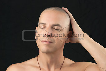Buddhist Feels Shaved Head