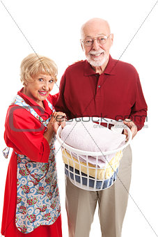 Senior Couple Doing Laundry Together