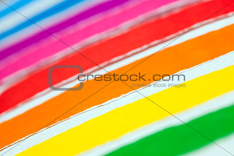 a group of colored paper