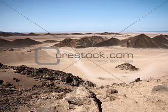 Road in the African desert among the mountains