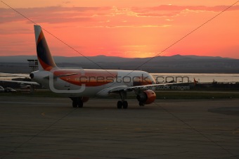 Plane and sunset