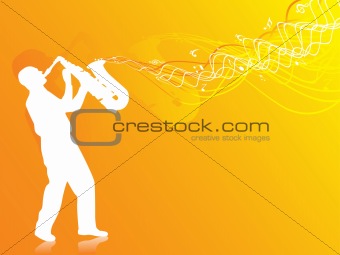 saxophone player silhouette in the orange lights