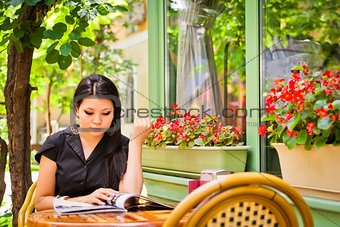 Beautiful asian girl in cafe
