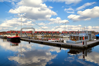 harbor at Reitdiephaven with sky reflected in water