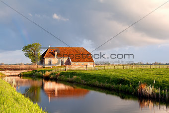 charming house by river in sunrise sunshine