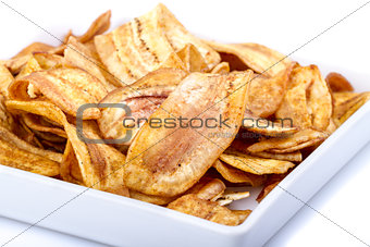 Crispy banana chip on white dish