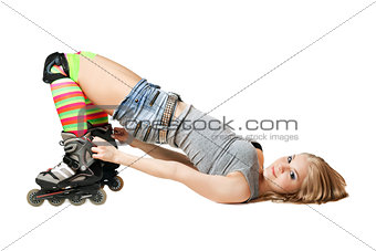 Lying pretty girl in roller skates