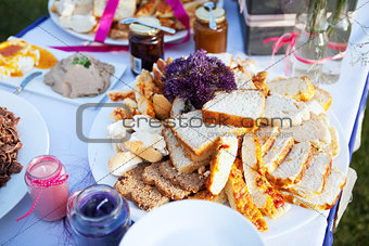 Assortment of bread and condiments