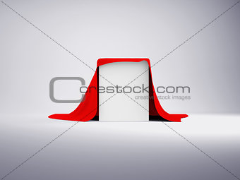 White box covered with red cloth