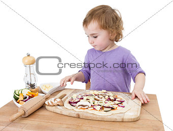 preschooler making fresh pizza