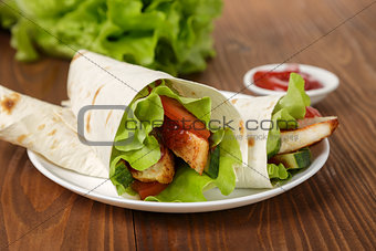 wheat tortilla with chicken and vegetables