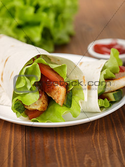 wheat tortilla with chicken and vegetables