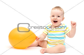 Happy baby with balloon