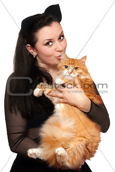 Portrait of young woman with a red cat