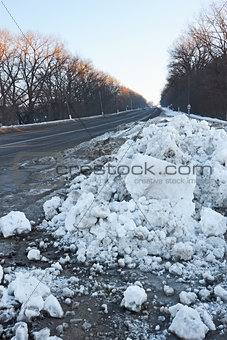 Big snow hummock on the roadside