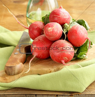 juicy ripe radish on a wooden table