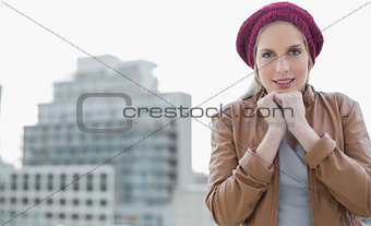 Shivering casual blonde posing outdoors