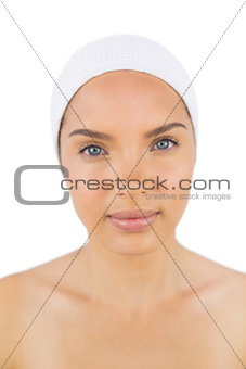 Beuatiful woman wearing a headband looking at camera