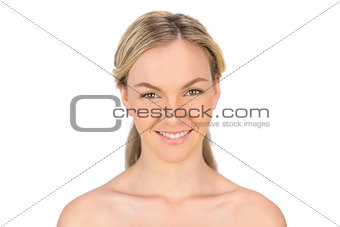 Smiling bare blonde posing