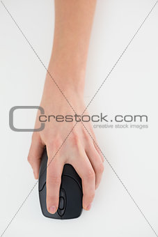 Close up of a hand using computer mouse