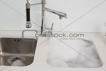 Close up of foam in kitchen sink