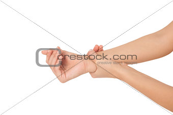 Close up of a young woman touching her wrist