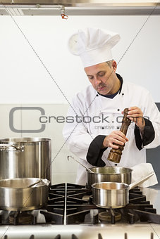 Concentrating head chef using pepper mill