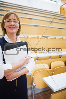 Elegant female teacher in lecture hall