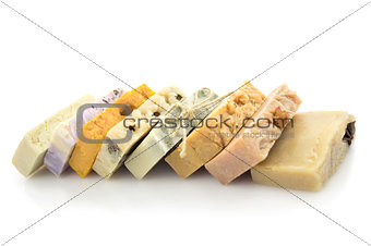 Row of handmade soap \ isolated on white