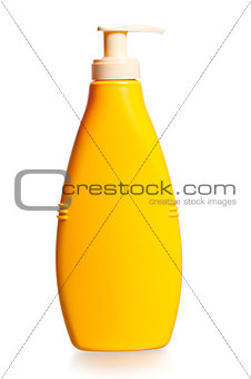 cosmetic bottle in yellow on a white background