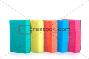 colorful sponges for washing dishes stand in a row