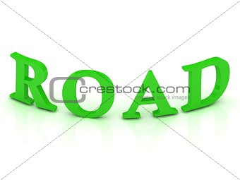 ROAD sign with green letters 