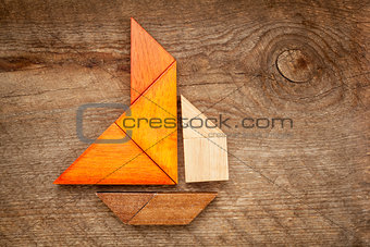 abstract sailboat from tangram puzzle