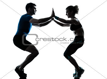 man woman exercising squats workout fitness silhouette