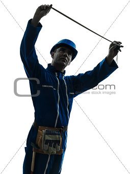 man construction worker holding Tape Measure silhouette