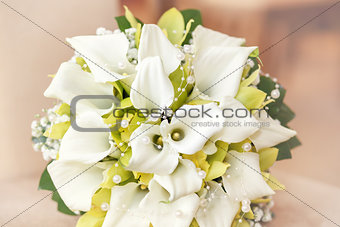 wedding bouquet with pearls, orchid and calla