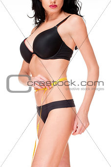 Woman in Black Underwear Measuring Results of Diet 