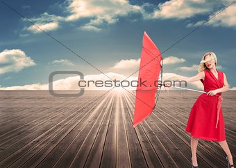 Attractive glamour woman holding a broken umbrella