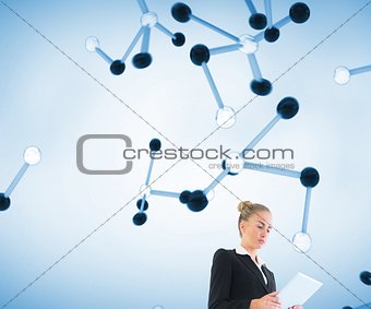 Blonde businesswoman holding new tablet