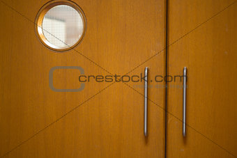 Detail shot of a closed wooden doors