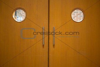Detail shot of a closed wooden doors