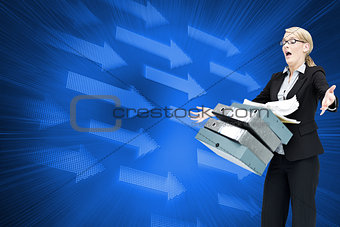 Composite image of businesswoman dropping folders